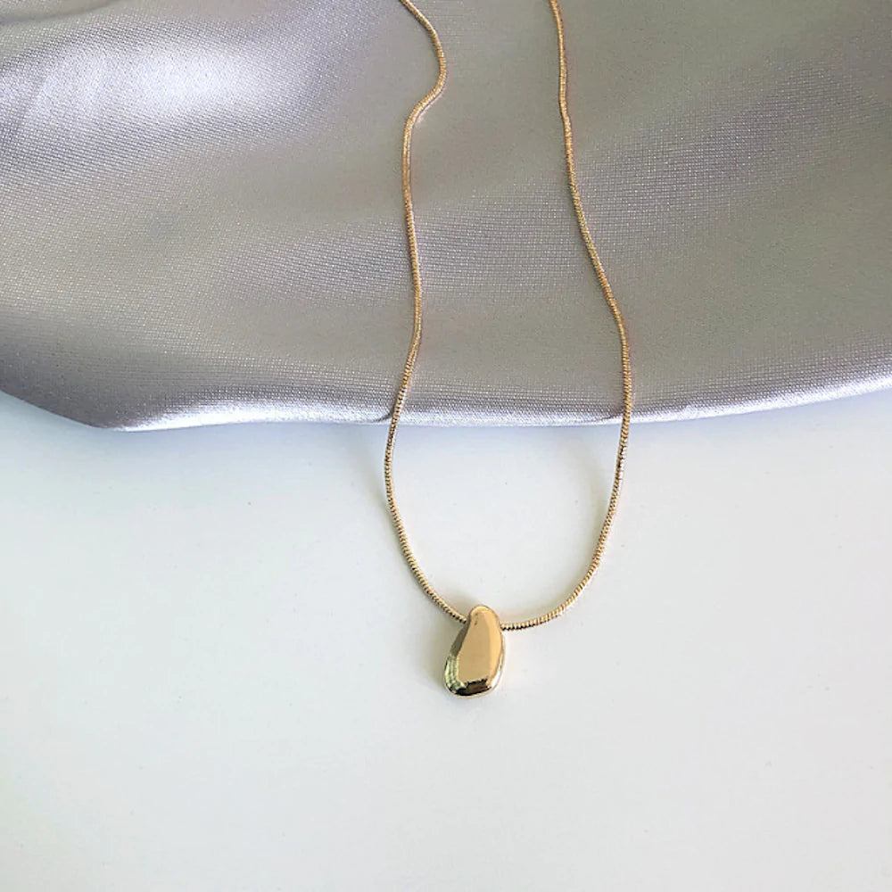 Necklace With A Bean Pendant